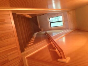 Cabin Remodel Stairway, new flooring, knotty alder paneling, knotty pine trim, new carpet