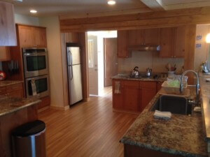 Twin Lakes Idaho Cabin Kitchen Remodel, new cabinets, countertops, flooring, knotty alder paneling